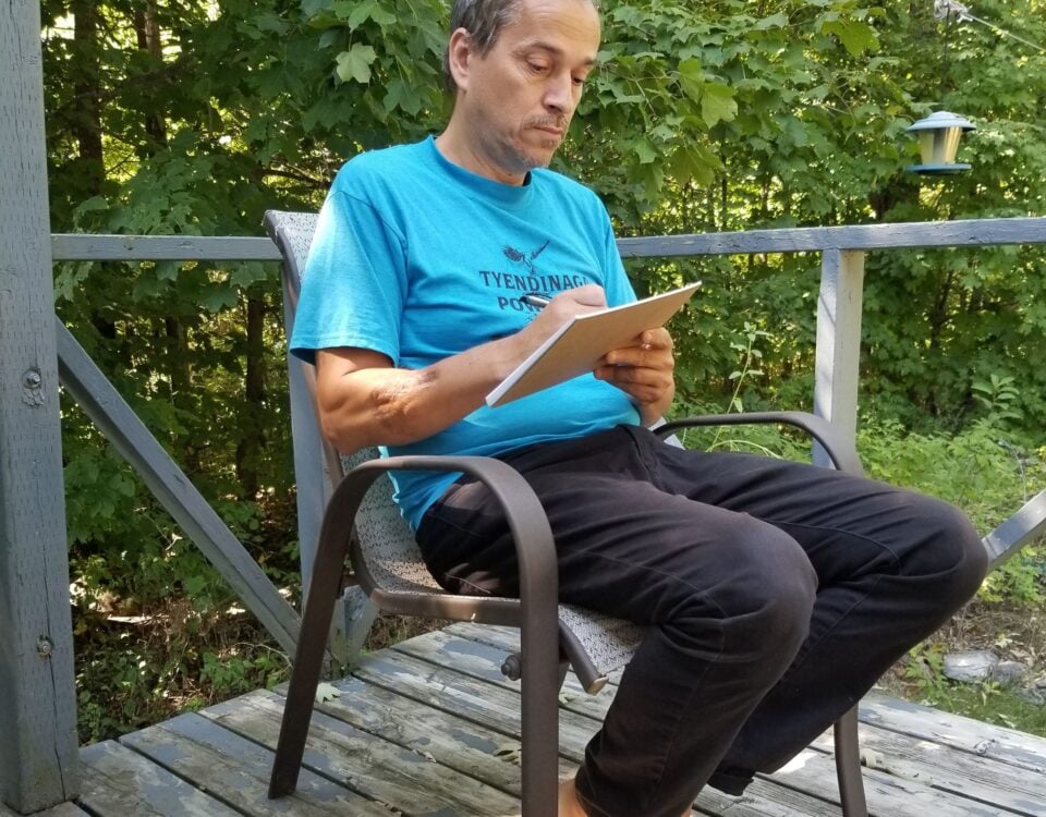 Photo of Fred Leonard writing.