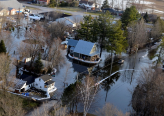 house surrounded by floodwater
